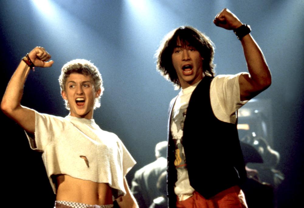 BILL AND TED'S EXCELLENT ADVENTURE, Alex Winter, Keanu Reeves, 1989, raised fist