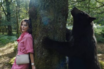 Keri Russell hides from the bear in COCAINE BEAR (2023)