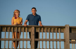 Scarlett Johansson and Channing Tatum on a pier in FLY ME TO THE MOON (2024)