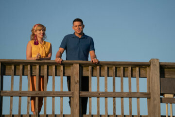 Scarlett Johansson and Channing Tatum on a pier in FLY ME TO THE MOON (2024)