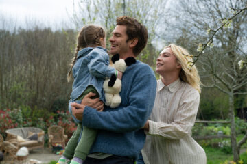 Andrew Garfield and Florence Pugh embrace their daughter in WE LIVE IN TIME (2024)